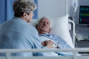 old couple on hospital bed